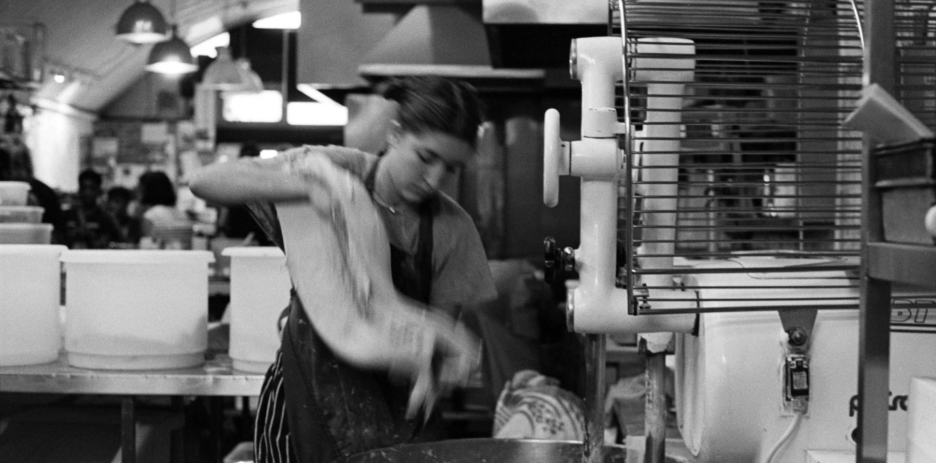Taking dough out of mixer